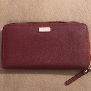 Used Kate Spade burgundy wallet